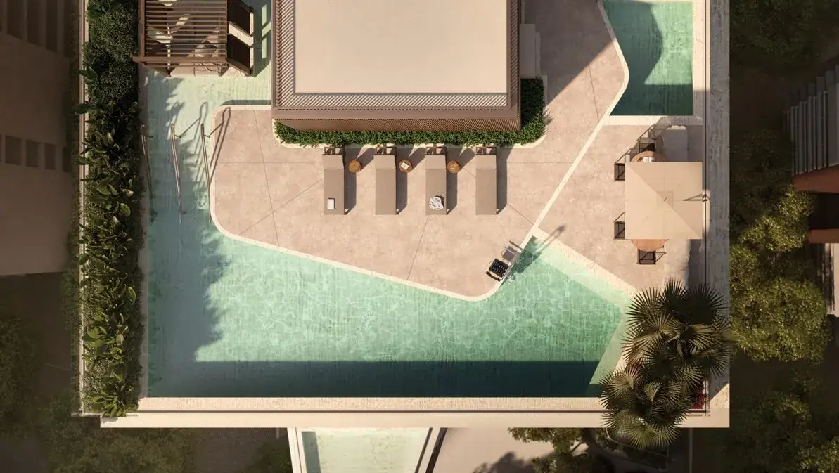 Vista aérea da piscina e solarium